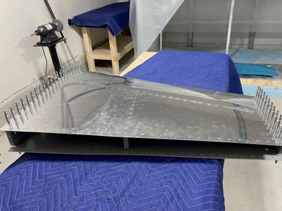 Skin riveted to the front spar assembly.