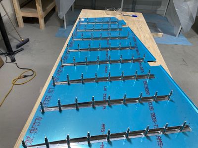 Stiffeners clecoed to the skin.