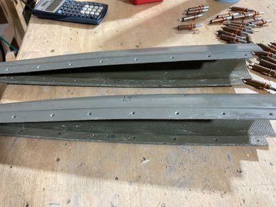 Aluminum strips are glued in place.