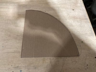The cardboard template.