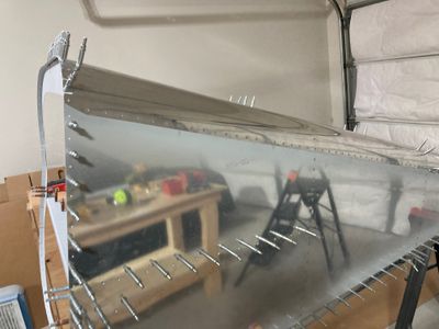 The row of rivets on the bottom of the fuselage.
