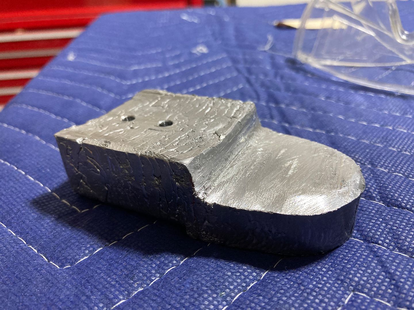 Weight trimmed with the hacksaw and the files.