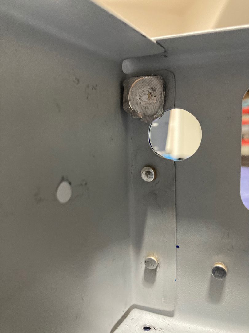 Using a piece of lead to push the flanges together.
