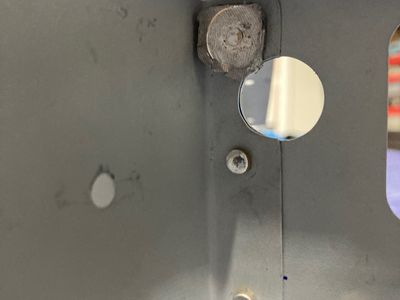 Using a piece of lead to push the flanges together.