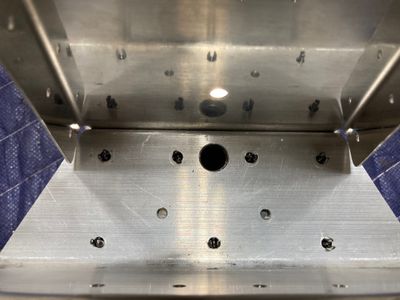Two extra holes on the horn side.