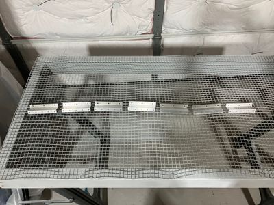 Priming the fuel tank brackets.