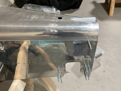 The aft is riveted.
