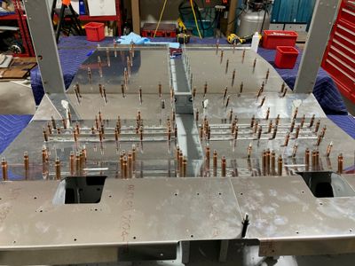 The hinges are drilled to the floors.