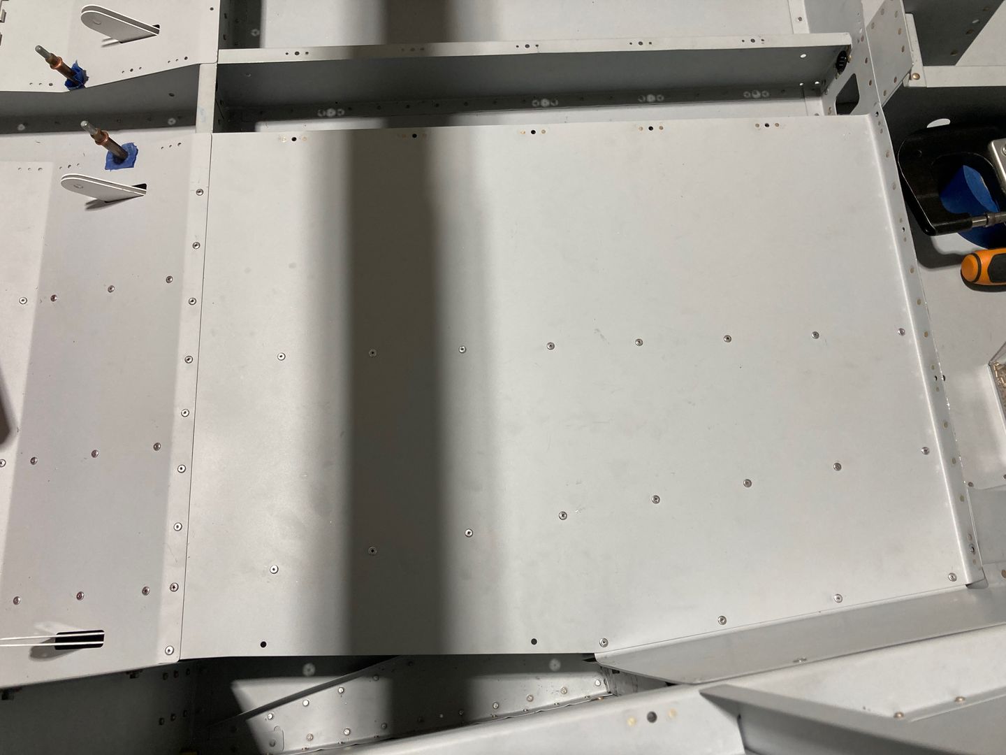 The F-747-L baggage floor and the F-750-L panel are riveted.