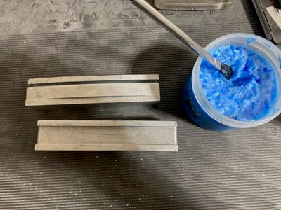 Lubricating the dies with Boelube.