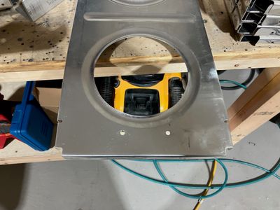 Drilling a hole for the mounting bracket.
