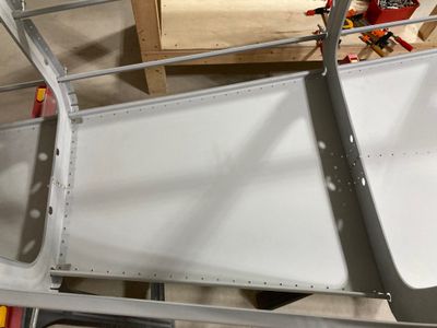Riveted the bulkheads to the bottom skin.