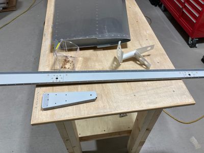 Riveted the nut plates and the reinforcement plates.