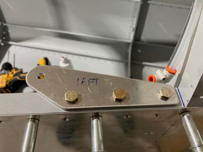 The shoulder harness anchors are drilled.