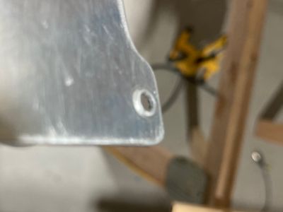 The dimple on the F-7101 web gear attach.