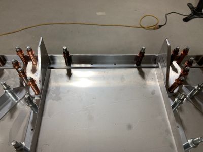 Both angles are clecoed in place.