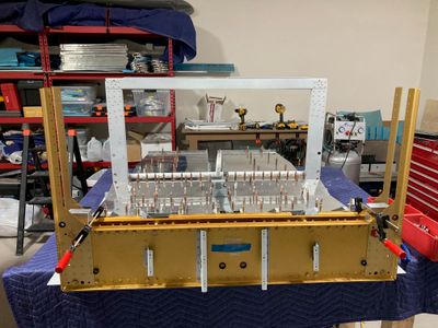 Finishing the longerons, continuing the center section