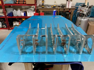 Clecoing the seat ribs.