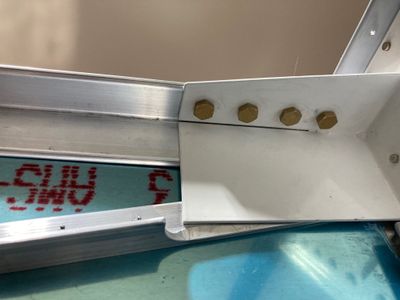 Drilling the bolt holes in the lower longerons