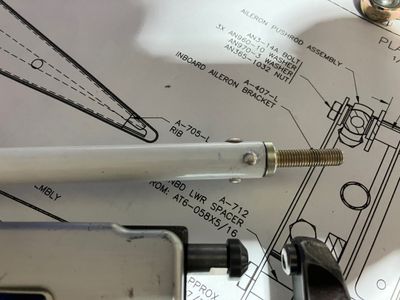 Riveted pushrod.