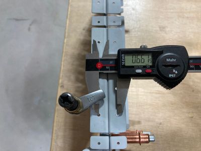 The distance on the flanges.