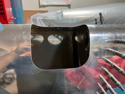 Hole after filing and sanding.