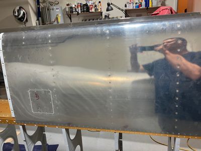 Riveting the left leading edge to the main spar