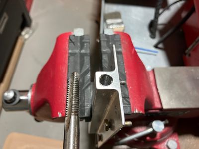 Threading holes for the tiedown rings.