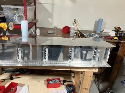 Riveting the rear baffle