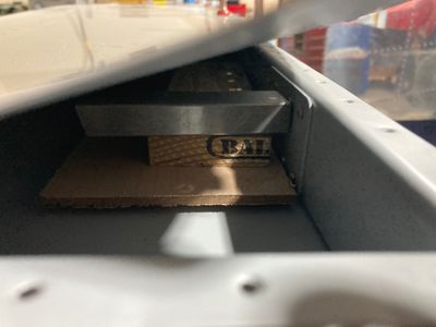 The makeshift bucking bar spacer.