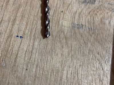 Broken drill bit.