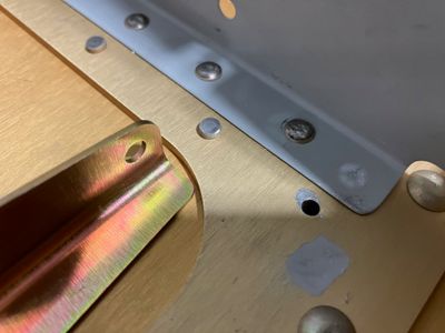 Drilled out the bad rivet.