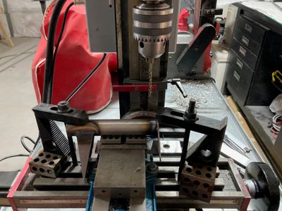 Drilling the tailspring mount.