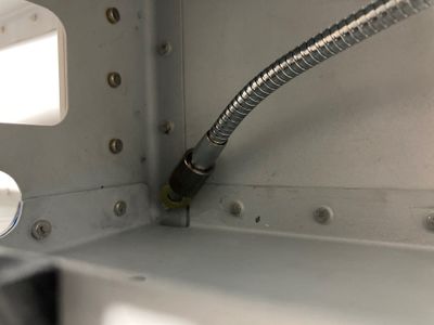 Fishing the washer from the hole.
