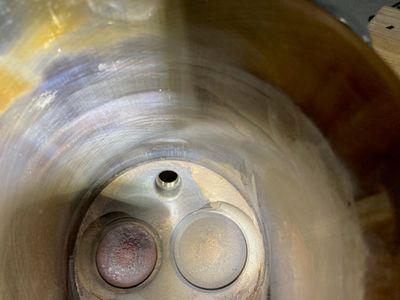 The inside of the cylinder.
