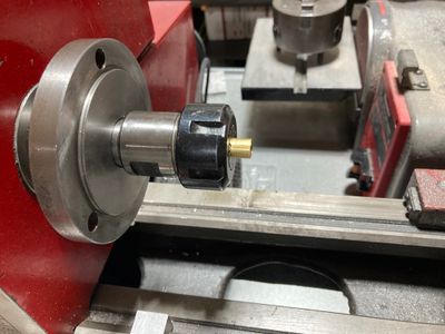 Machining the bushing in the lathe.