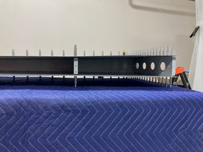 Skins clecoed onto the front spar assembly.
