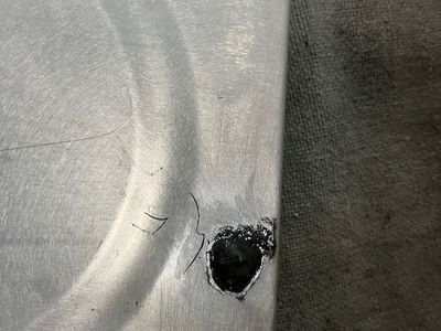 The tooling hole.