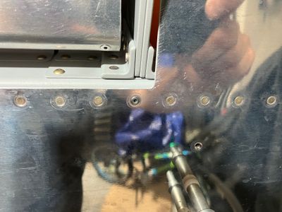 A blind rivet in a difficult spot.