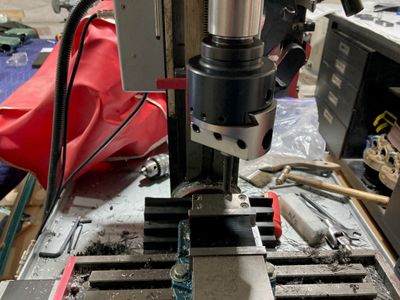 Using the boring head to finish the hole.