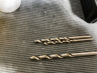 The broken drill bits.