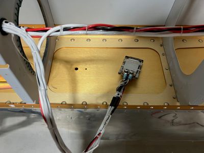 Finishing wiring the right wing