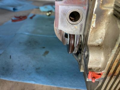 A damaged thrust button debris.