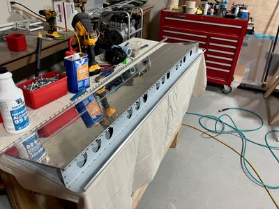 The flap is fully riveted.