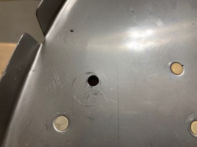 Hole straightened and reamed.