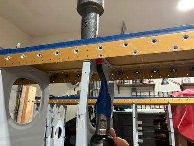The positioning of the rivet gun.