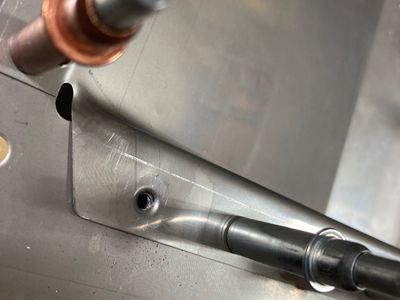 Hole filed to fit.