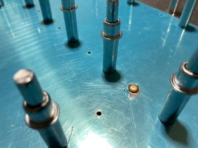 The hole with the AN470AD4 rivet in it.