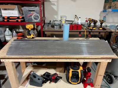 Riveting the left aileron