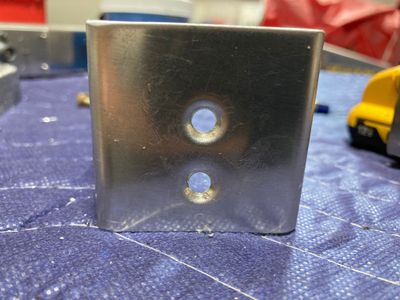 Dimpled counterweight skin.